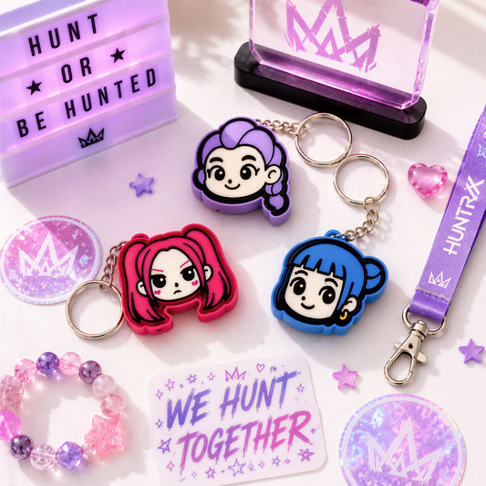 various colorful keychains, a sign with the phrase "WE HUNT TOGETHER", and some small decorative items such as hearts and beads.