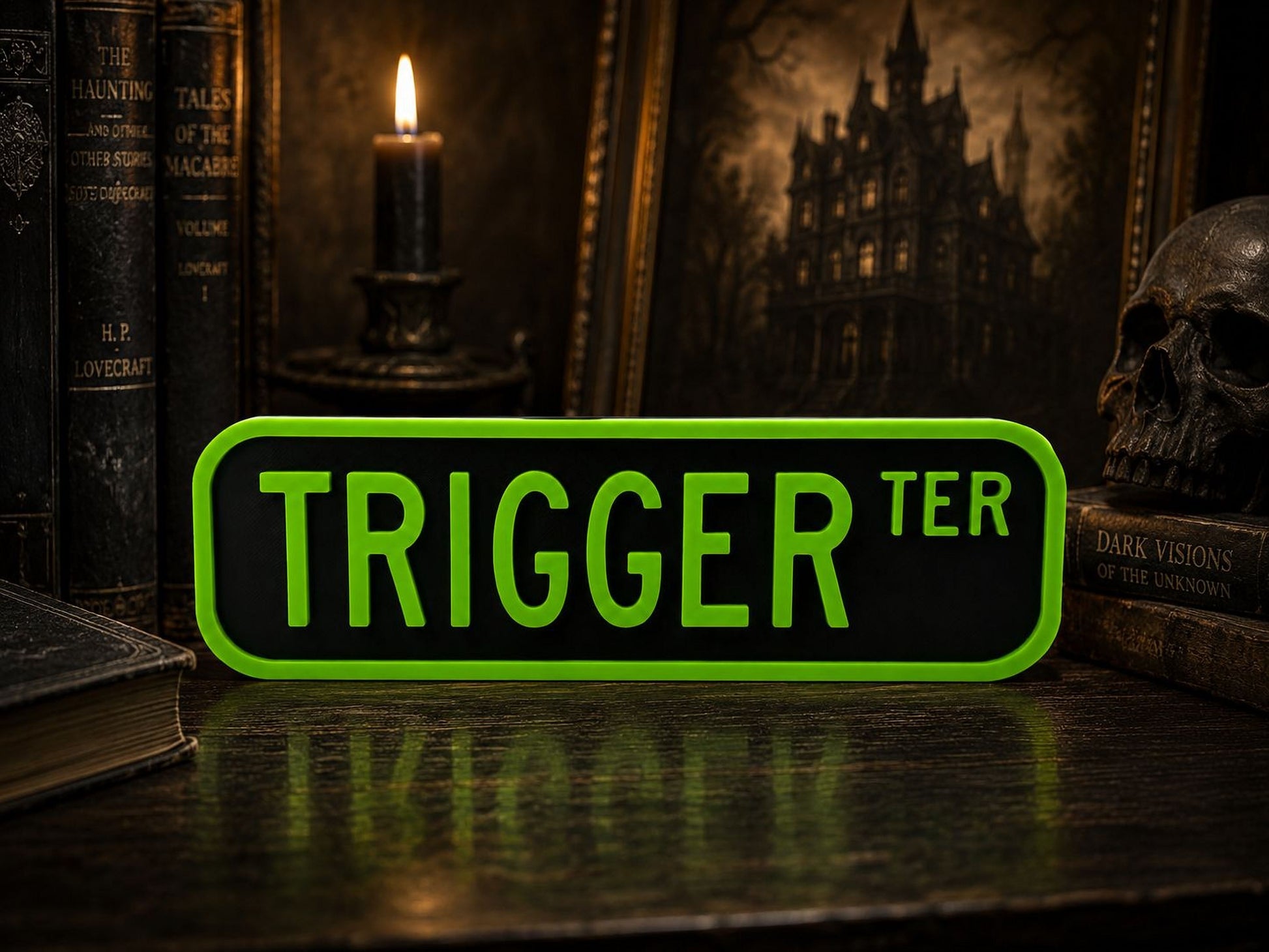 a green sign with the word "TRIGGER" in large white letters, surrounded by various books and a skull on a dark surface.