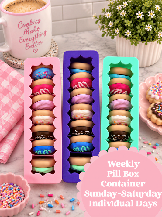a variety of colorful donuts arranged in three pink pill box containers, with a coffee mug and a potted plant in the background.