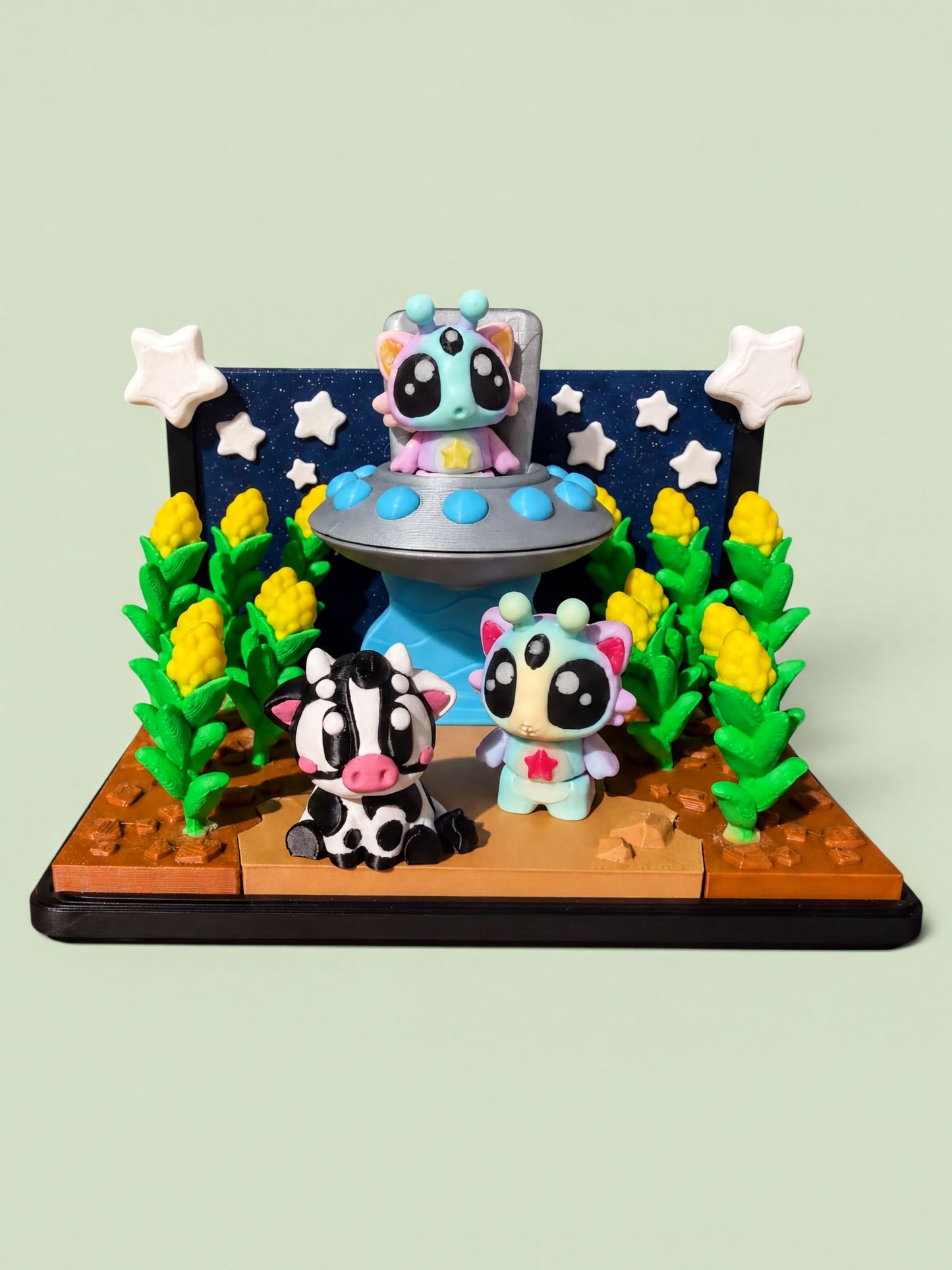 A whimsical scene featuring three colorful, cartoonish animal figurines in a playful, imaginative setting.