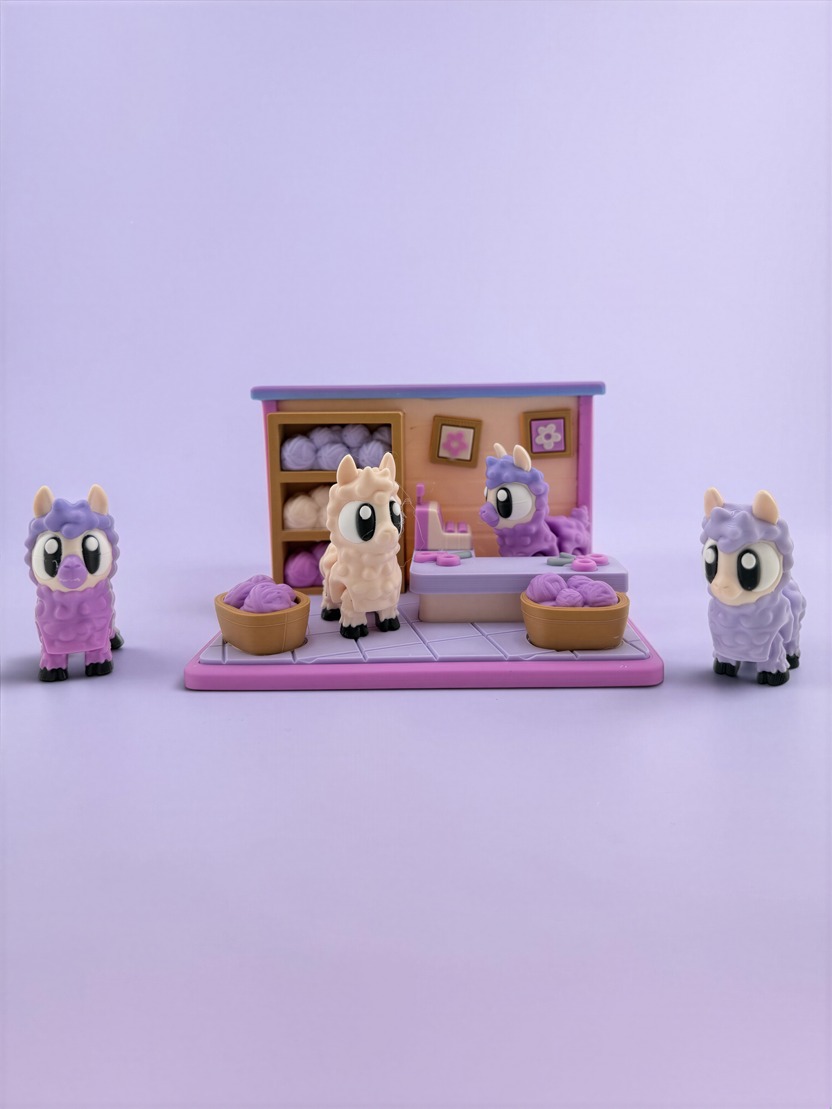 A toy shop scene with four small toy llamas in various colors, including purple, pink, and white, arranged in front of a pink and purple toy shop display.