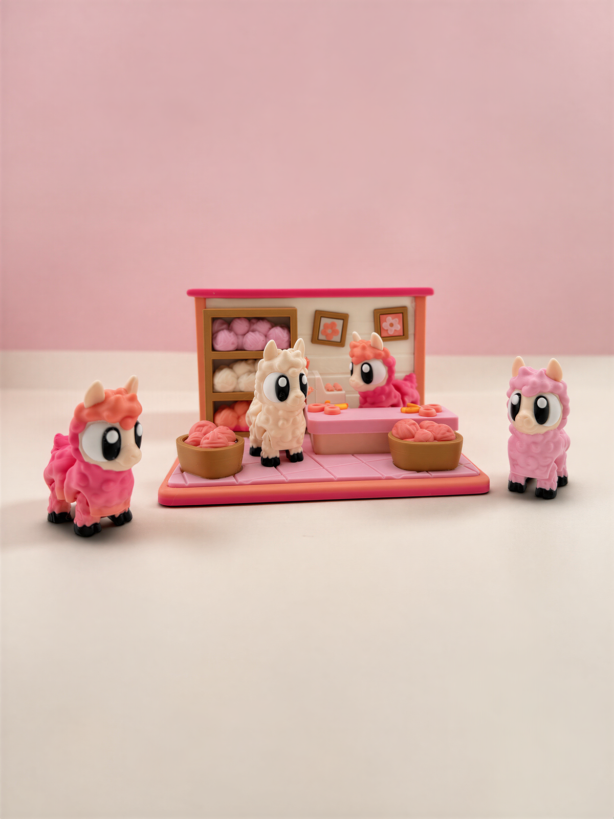 A pink toy shop with three small pink toy animals, including a pink bunny, a pink llama, and a pink pig, arranged on a pink and white background.