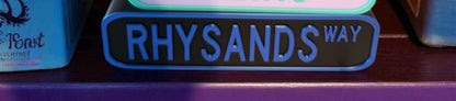 Street sign shelf sitter